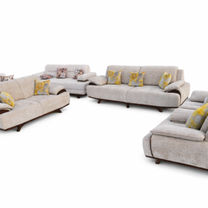 Executive beige sofa set with wide curved arms and multiple matching seats displayed outside a Nairobi showroom