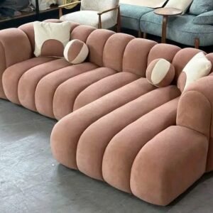 curved blush pink 3 seater sofa with channel tufted design living room furniture Kenya