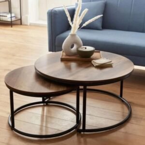 white marble‑look nesting coffee tables with black metal frames in Kenya home