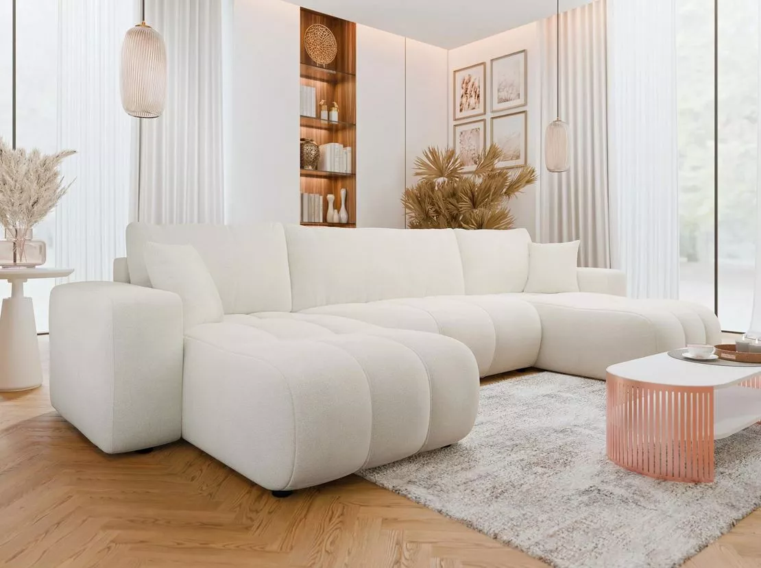 Large cream sectional sofa with chaise extensions in living room Kenya