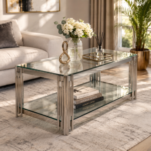 Luxury glass coffee table with chrome frame and lower shelf in a modern living room Kenya