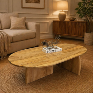oval wooden coffee table with sculptural base in Nairobi living room