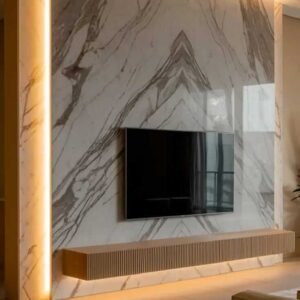 Marble TV wall with LED backlighting and floating ribbed console in a modern Kenya living room