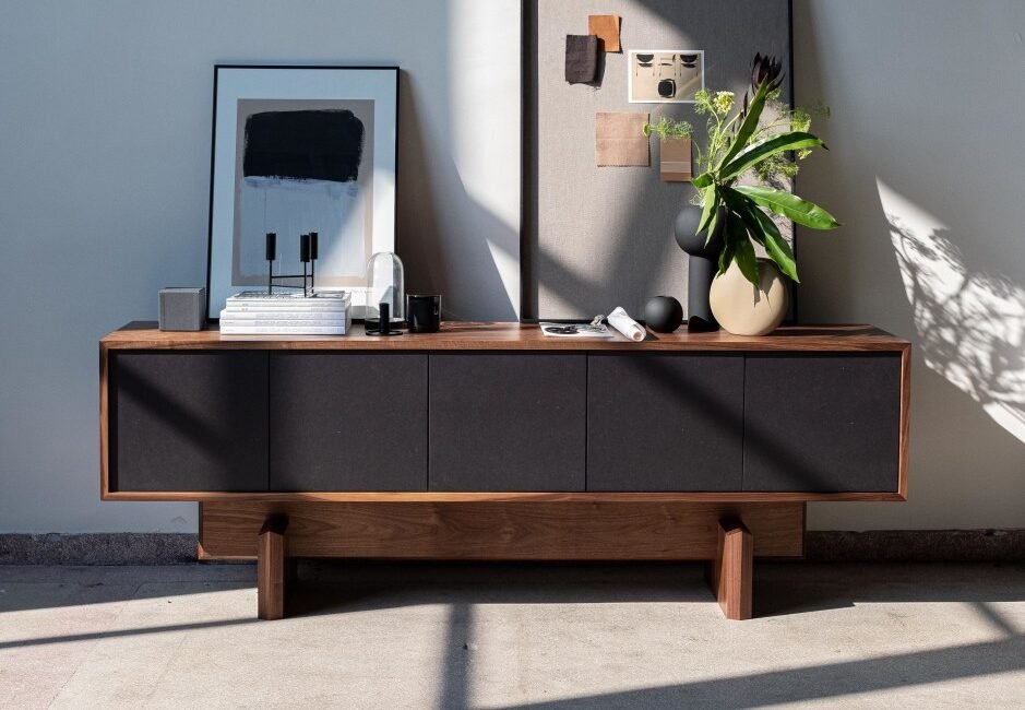 Minimalist wooden TV cabinet with dark panels in modern living room Kenya