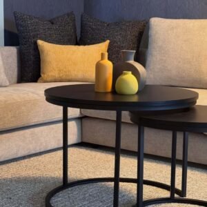 Black round nesting coffee table Kenya with slim frame and open circular bases for modern lounges