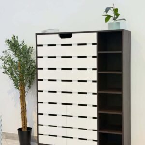 White shoe rack Kenya with dark frame, slatted front panels, open shelves, and raised legs