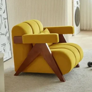 Mustard accent chair with curved back and dark tapered legs for Kenya lounge spaces