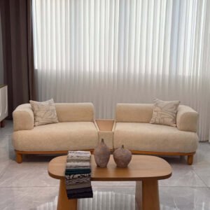 Light wooden oval coffee table with curved pedestal legs for Kenya living rooms