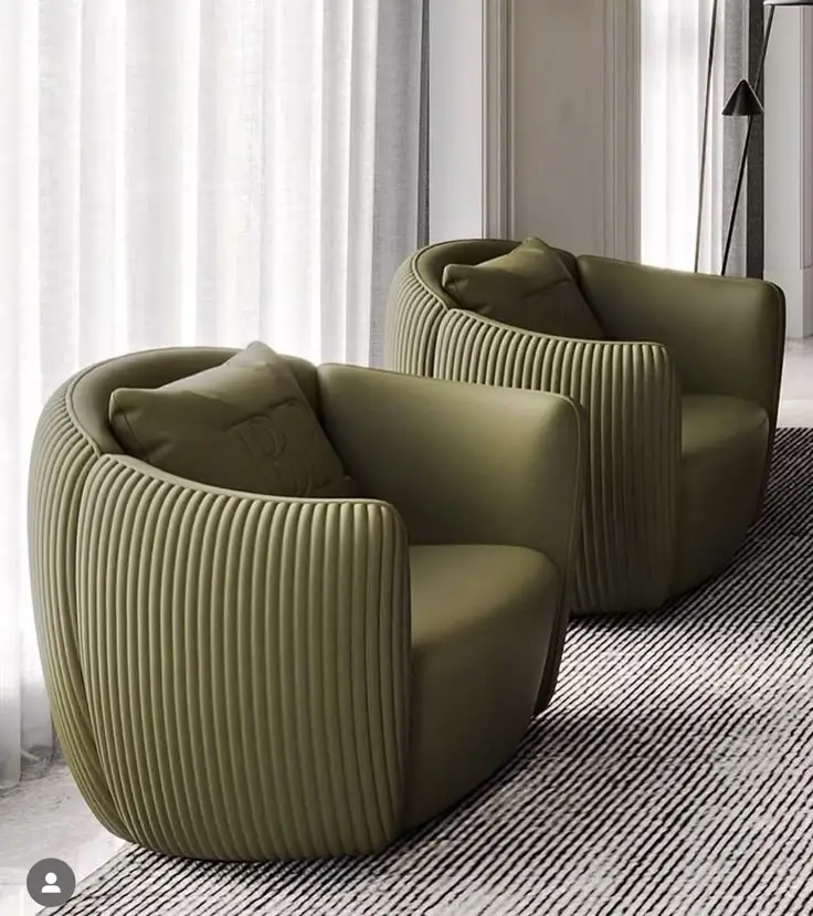 Green textured accent chair with rounded seat and wraparound back for Kenya interiors