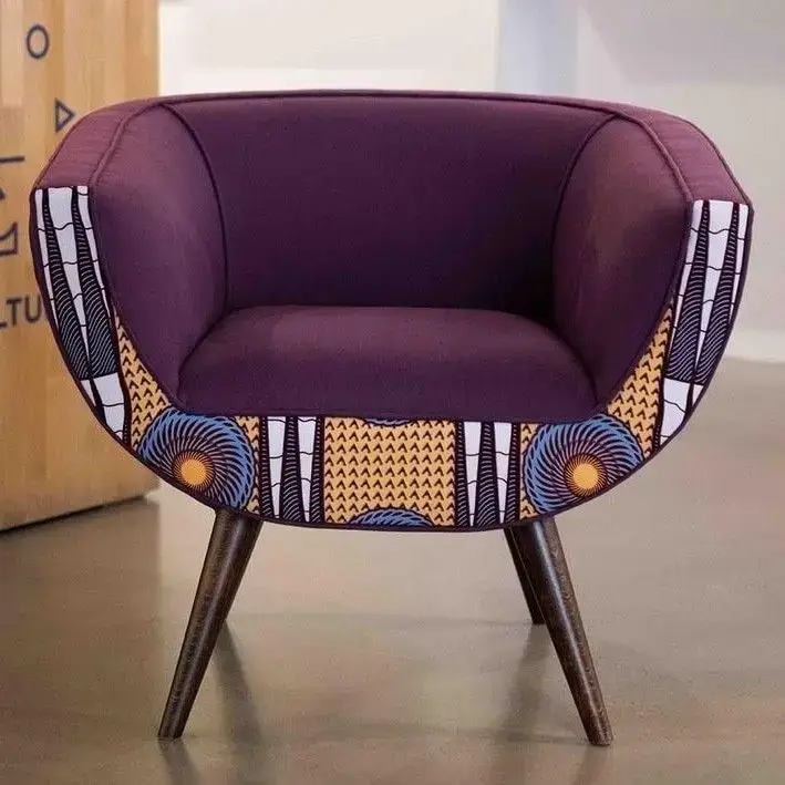 Purple tub accent chair with patterned outer panels and tapered legs for Kenya lounges