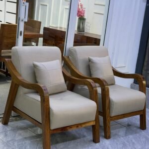 Modern 3 seater sofa Kenya style shown with beige upholstery, wooden arms and throw pillows