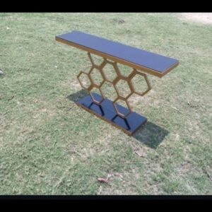 Modern black and gold console table with honeycomb support for entryways in Kenya