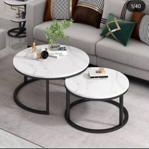 Round nesting coffee table set with marble-look tops and black frames for modern living rooms in Kenya