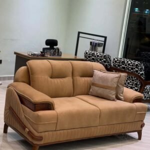 Tan sofa set with tufted backrest and wood-tone accents for modern living rooms in Kenya