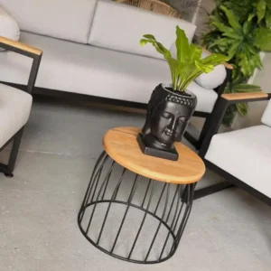 Round side table with wood-look top and black wire base for plant display in Kenya