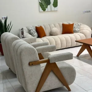 Cream channel-tufted sofa set with cushions for modern living rooms in Kenya