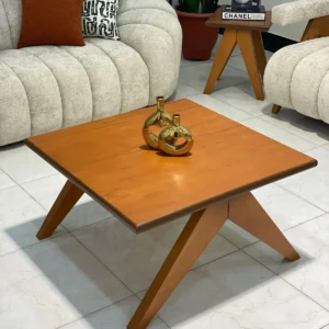 Square wood-look coffee table with angled legs for modern living rooms in Keny