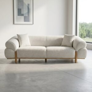 Cream rolled arm sofa with textured upholstery and wood-tone legs for modern Kenya living rooms