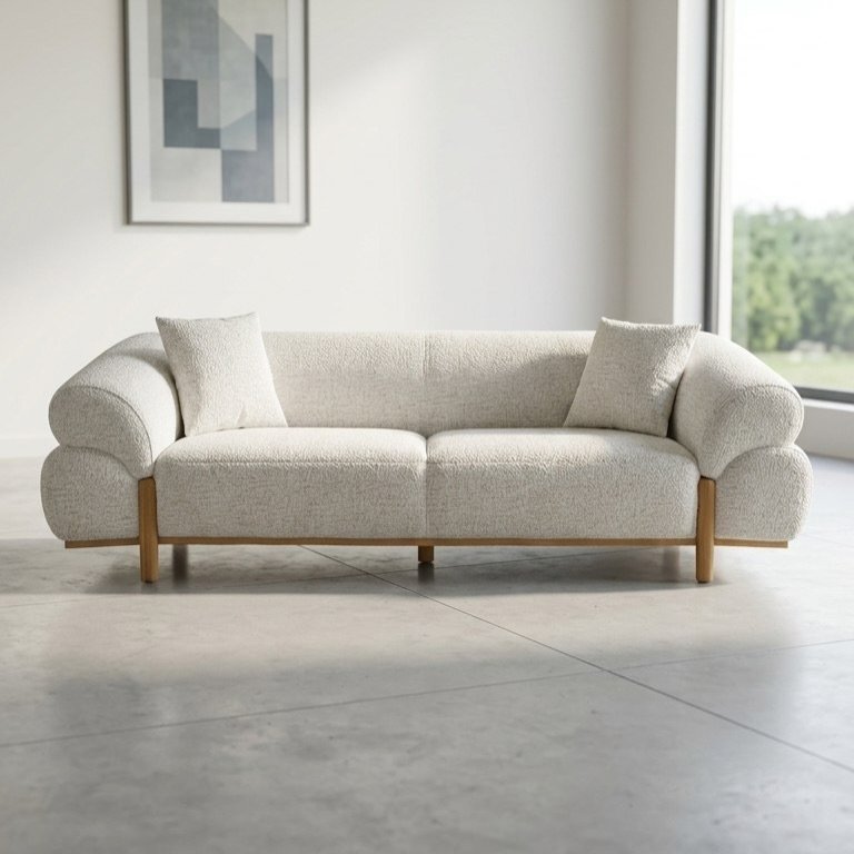 Cream rolled arm sofa with textured upholstery and wood-tone legs for modern Kenya living rooms