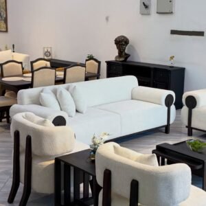 Ivory 3 seater sofa Kenya with rounded roll arms, black side accents and throw pillows