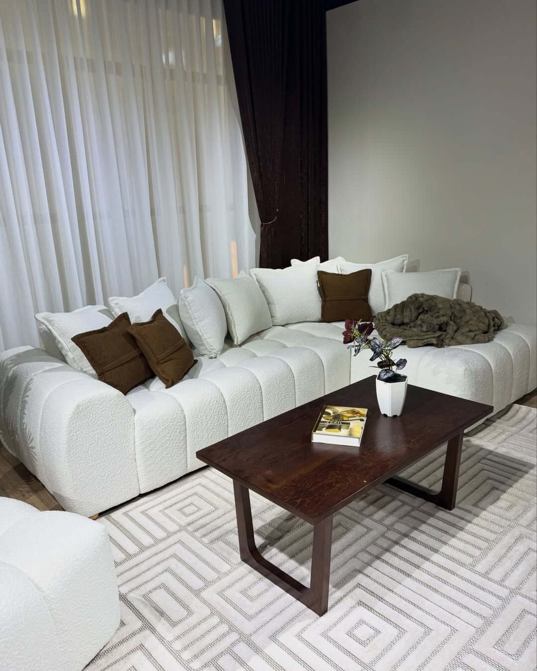 Cream L shape sofa with chaise seating and textured upholstery for modern Kenya living rooms