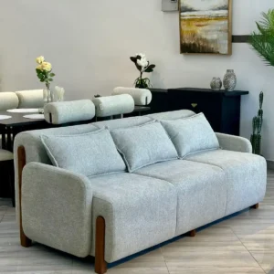 Light grey sofa set Kenya with rounded arms, wooden side accents and matching pillows