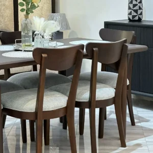 Wooden dining table set Kenya with curved chairs and grey padded seats