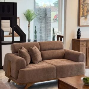 Brown 2 seater sofa with rounded arms, textured upholstery and wood-tone legs for Kenya living rooms
