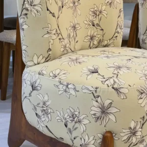 Floral accent chair Kenya with cream patterned upholstery, rounded cushions and wooden legs