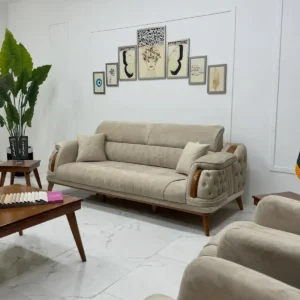 Beige sofa set Kenya with rolled arms, tufted side panels, wood-tone accents, and throw pillows