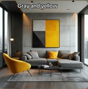 Grey and yellow living room — concrete accent wall, yellow accent chair, L-shaped grey sofa