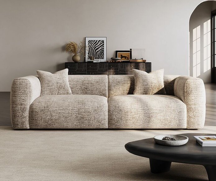 Text: Cream rolled arm sofa with beige textured upholstery for modern Kenya living rooms