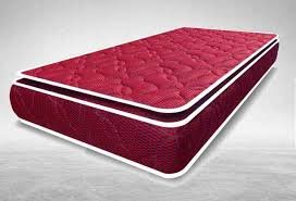 Red pillow top mattress Kenya with quilted sleeping surface and structured side panel
