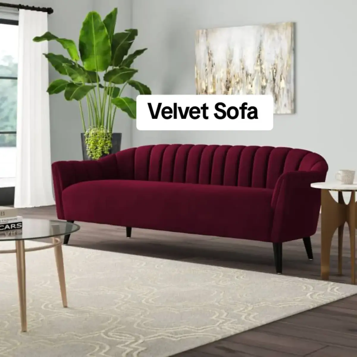 Burgundy velvet channel-tufted sofa with mid-century legs — dramatic and rich, Nairobi living room
