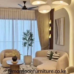 Beige curved 3 seater bouclé sofa with modern sculptural design for living rooms in Kenya