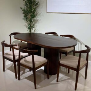 Celine oval dark wood dining table with two vertically fluted cylindrical pedestal bases.