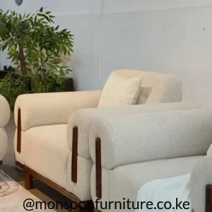 Cream curved 3 seater sofa with walnut wooden frame for modern living rooms in Kenya
