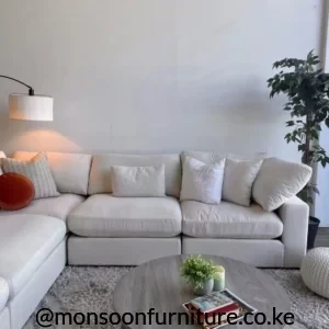 Cream modular L shape sofa with chaise and deep cushions for modern living rooms in Kenya