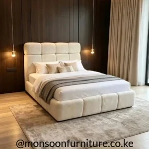 Cream upholstered panel bed with tall cushioned headboard for modern bedrooms in Kenya