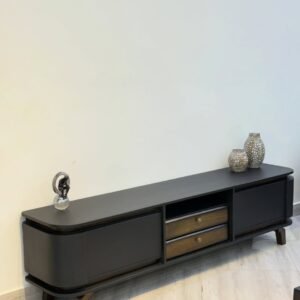 Black rounded 2 drawer TV cabinet Kenya with wood-tone drawers, open centre shelf, closed side storage and angled legs.