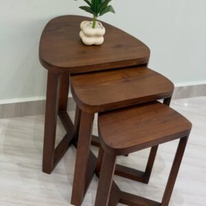 Brown 3 piece nesting coffee table set Kenya with rounded wood-look tops and angled legs