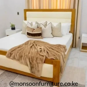 Oak wood upholstered 5×6 bed with cream padded headboard and footboard in Kenya