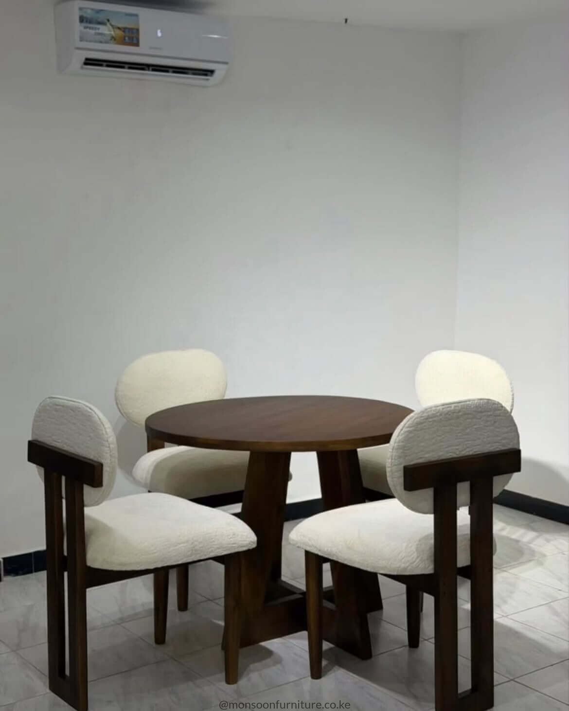 Walnut round 4 seater pedestal dining set with upholstered chairs in Kenya