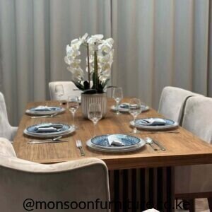 Walnut slatted pedestal 6 seater dining set Kenya with cream upholstered dining chairs.