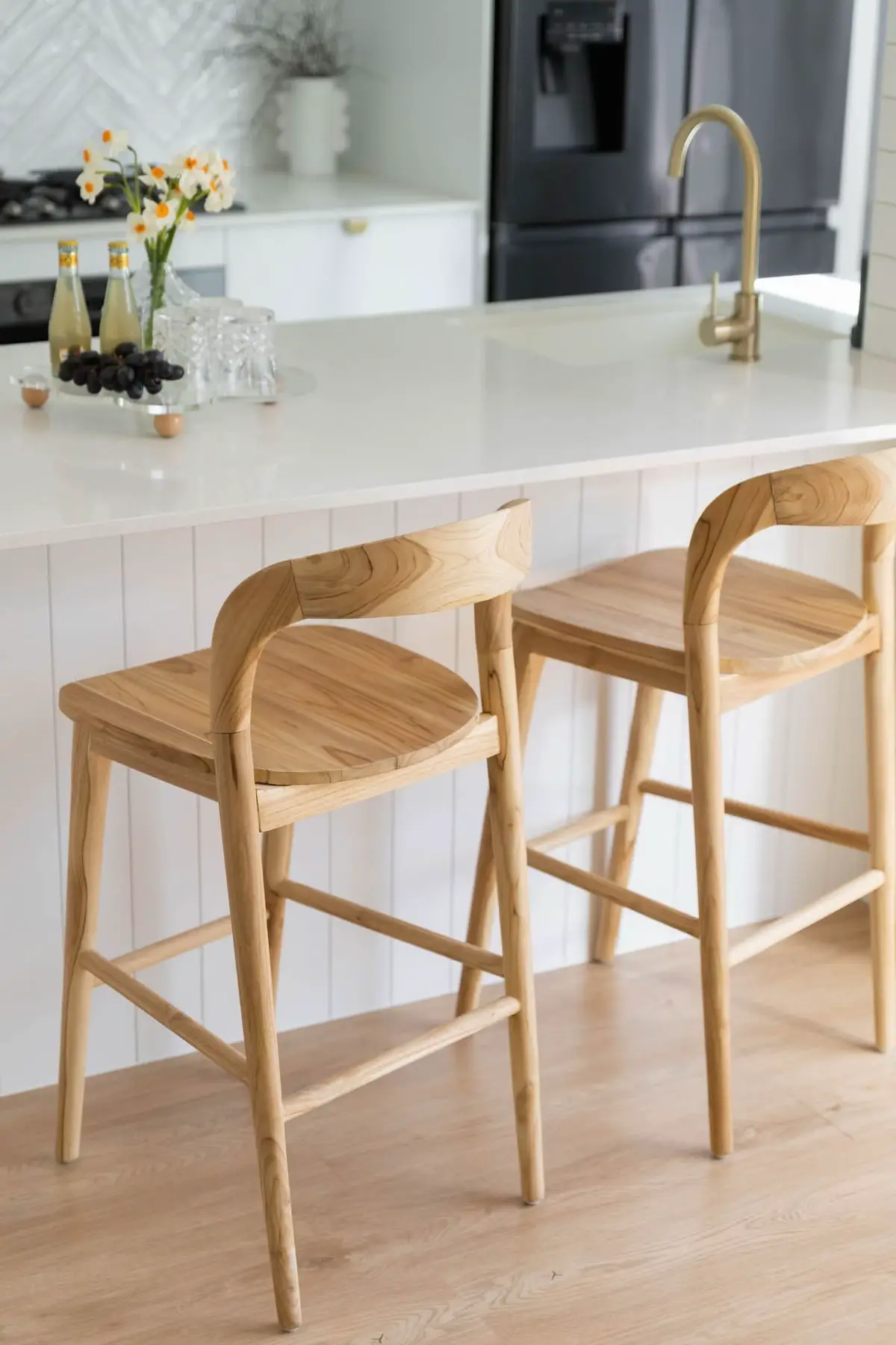 Modern bar stools at a kitchen island in a Nairobi open-plan home