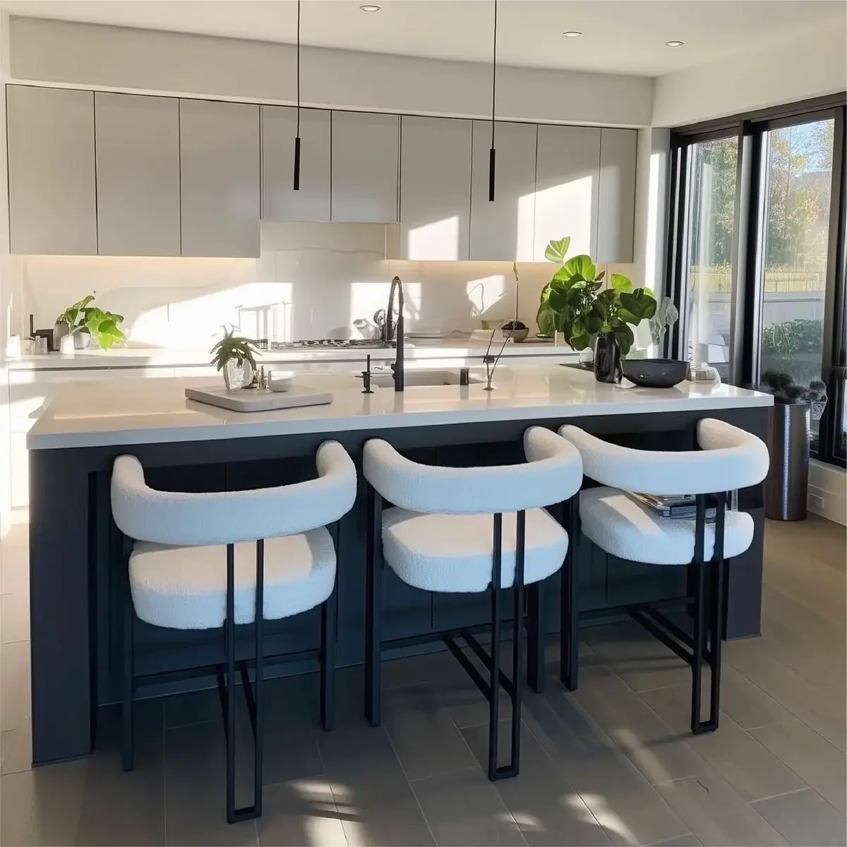 Adjustable swivel bar stool with gas lift and footrest in a modern kitchen
