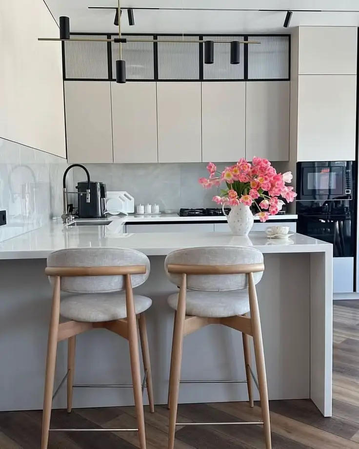 Bar stools in neutral and accent colours styled in a Kenyan kitchen