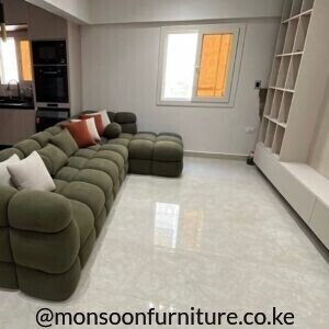 Olive green bubble L shape sofa Kenya with rounded padded seats, low back, wide arms and a right-side chaise.