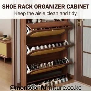 Dark brown three-tier flip shoe cabinet with tan woven fronts, gold-tone pulls and shoes stored inside.
