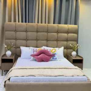 5×6 beige padded bed with extra-tall rectangular panel headboard and matching bedside tables in a modern bedroom